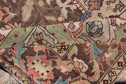 Antique Persian Malayer Gallery Rug with Large Floral Medallion With Soft Colors. Keivan Woven Arts / rug W22 - 0402 - 15478, country of origin / type: Iran / Malayer, circa 1920. Measures: 6'8 x 12'9 This multicolored Antique Persian Malayer wide g... - Keivan Woven ArtsW22 - 0402 - 15478 - 20091Rug