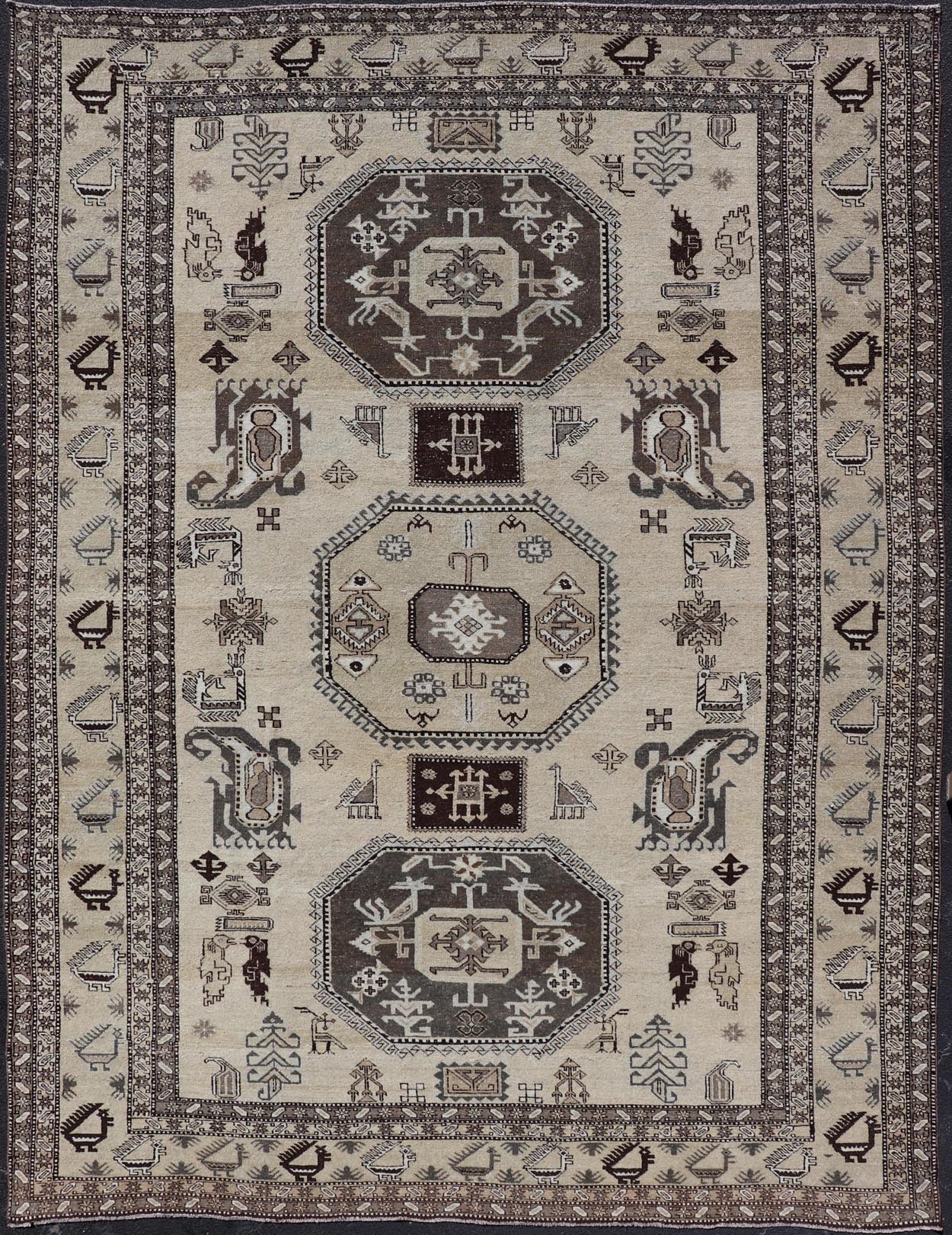Persian Ardebil Carpet with three Octagon Medallions & Stylized Tribal Motifs. Vintage Ardebil carpet with Stylized tribal motifs in very Pale Green, Ivory, Mocha, Camel, Brown & Gray with three Octagon medallions. Keivan Woven Arts/ rug W22 - 0405, ... - Keivan Woven ArtsW22 - 0405 - 20109