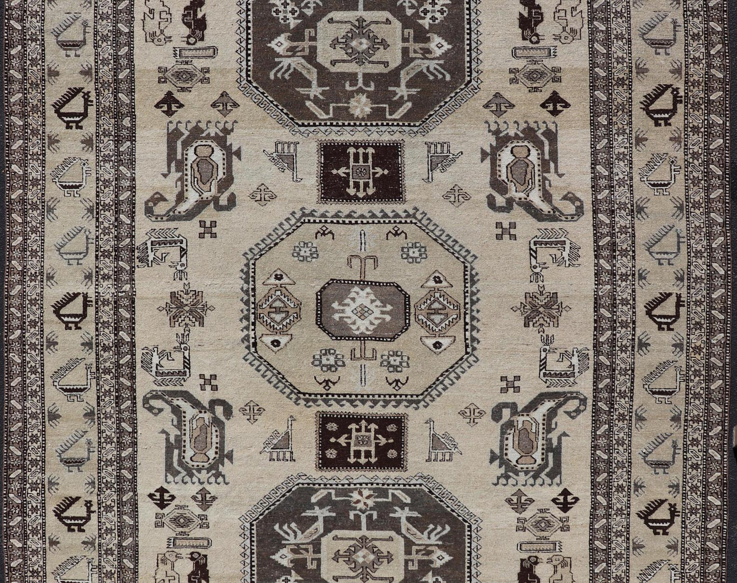 Persian Ardebil Carpet with three Octagon Medallions & Stylized Tribal Motifs. Vintage Ardebil carpet with Stylized tribal motifs in very Pale Green, Ivory, Mocha, Camel, Brown & Gray with three Octagon medallions. Keivan Woven Arts/ rug W22 - 0405, ... - Keivan Woven ArtsW22 - 0405 - 20109