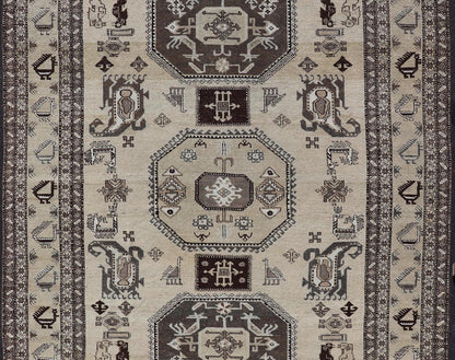 Persian Ardebil Carpet with three Octagon Medallions & Stylized Tribal Motifs. Vintage Ardebil carpet with Stylized tribal motifs in very Pale Green, Ivory, Mocha, Camel, Brown & Gray with three Octagon medallions. Keivan Woven Arts/ rug W22 - 0405, ... - Keivan Woven ArtsW22 - 0405 - 20109