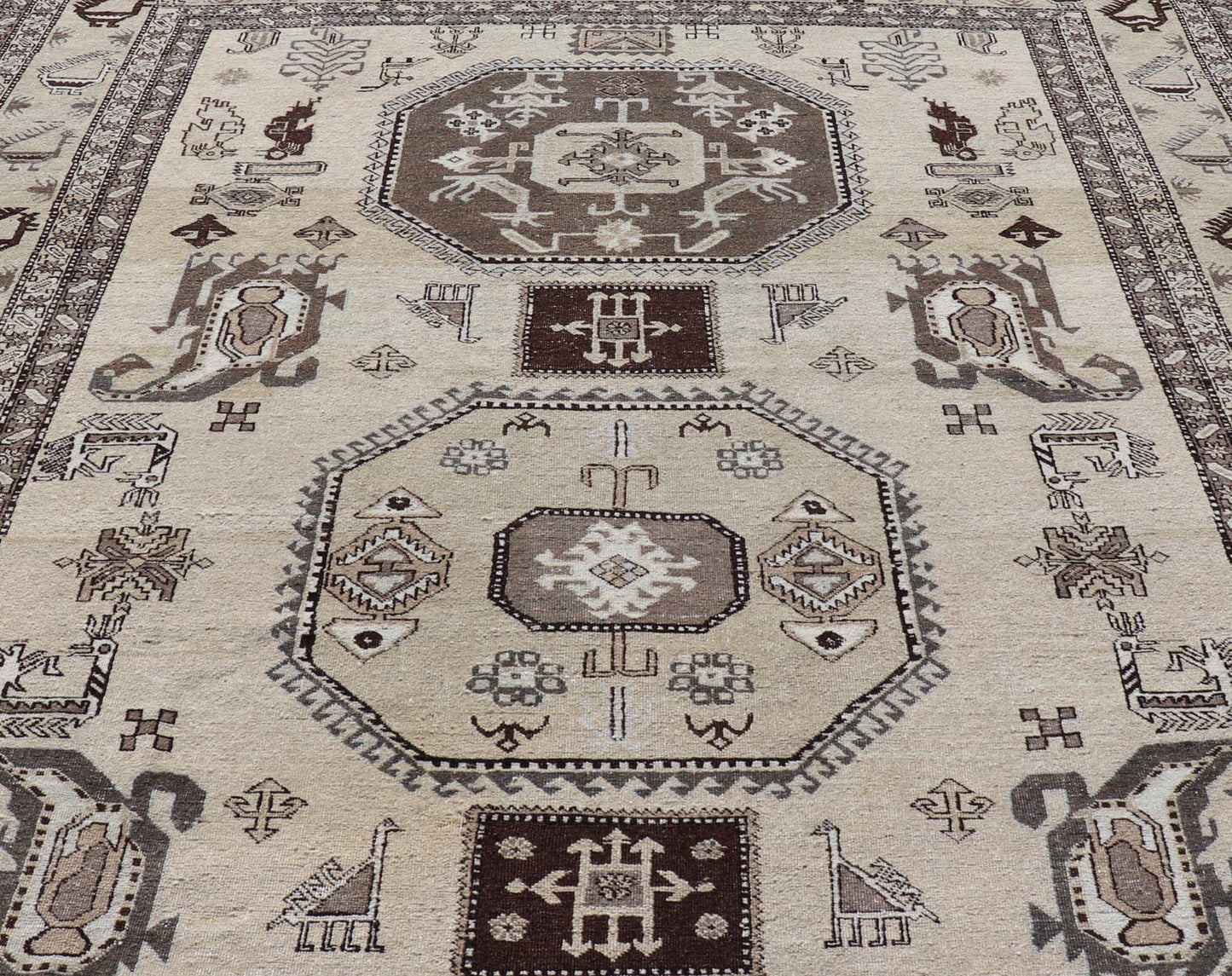 Persian Ardebil Carpet with three Octagon Medallions & Stylized Tribal Motifs. Vintage Ardebil carpet with Stylized tribal motifs in very Pale Green, Ivory, Mocha, Camel, Brown & Gray with three Octagon medallions. Keivan Woven Arts/ rug W22 - 0405, ... - Keivan Woven ArtsW22 - 0405 - 20109