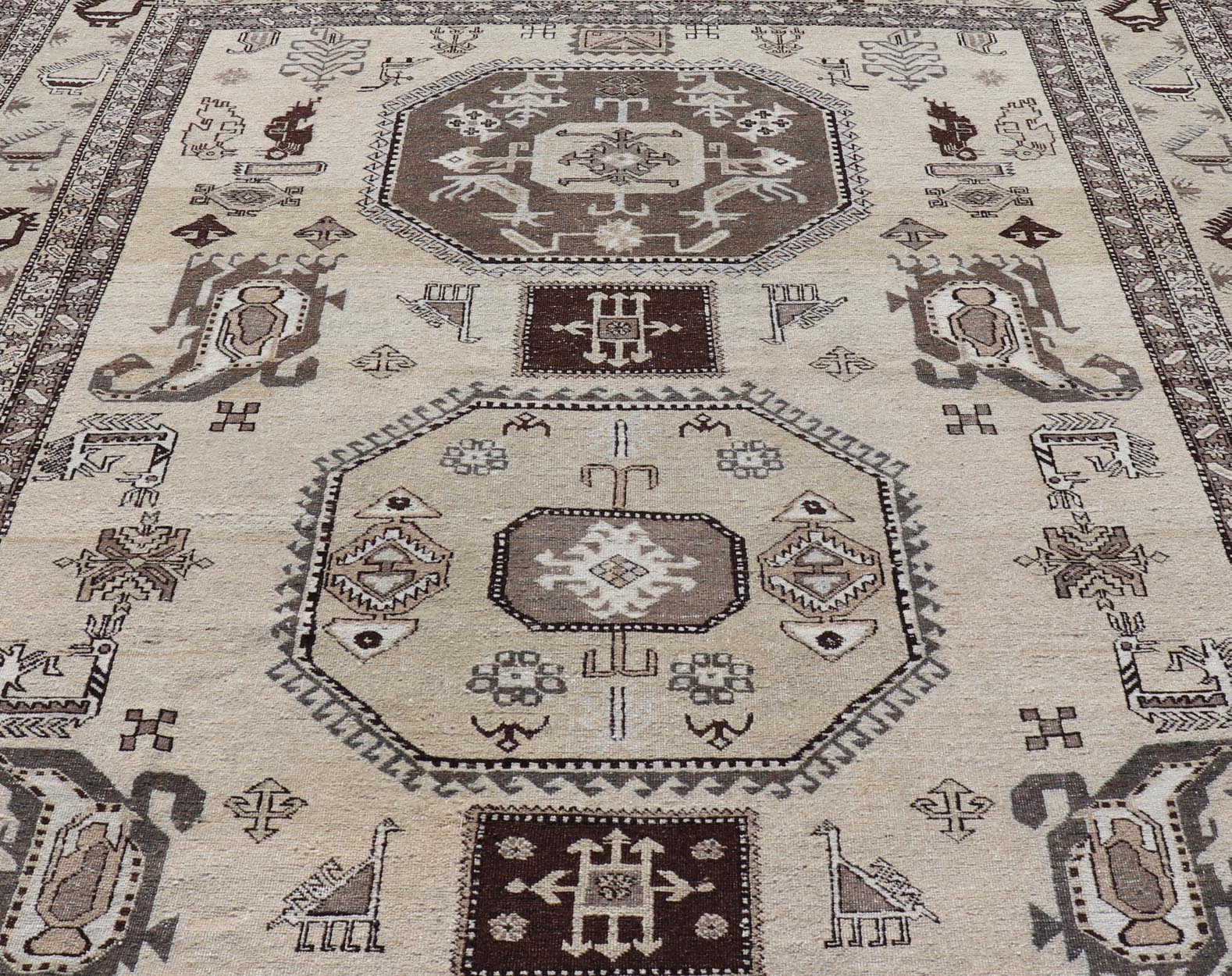 Persian Ardebil Carpet with three Octagon Medallions & Stylized Tribal Motifs. Vintage Ardebil carpet with Stylized tribal motifs in very Pale Green, Ivory, Mocha, Camel, Brown & Gray with three Octagon medallions. Keivan Woven Arts/ rug W22 - 0405, ... - Keivan Woven ArtsW22 - 0405 - 20109