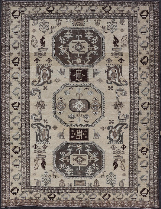 Persian Ardebil Carpet with three Octagon Medallions & Stylized Tribal Motifs. Vintage Ardebil carpet with Stylized tribal motifs in very Pale Green, Ivory, Mocha, Camel, Brown & Gray with three Octagon medallions. Keivan Woven Arts/ rug W22 - 0405, ... - Keivan Woven ArtsW22 - 0405 - 20109Rug