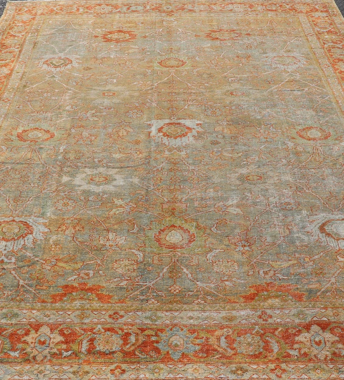 Antique Persian Distressed Sultanabad Rug in Light Green, Lt. Blue, Green, Red. Keivan Woven Arts / rug W22 - 0406 - 15480, country of origin / type: Iran / Sultanabad, circa 1900. Measures: 8'8 x 12'2 This beautiful distressed antique Persian Sult... - Keivan Woven ArtsW22 - 0406 - 15480 - 20115