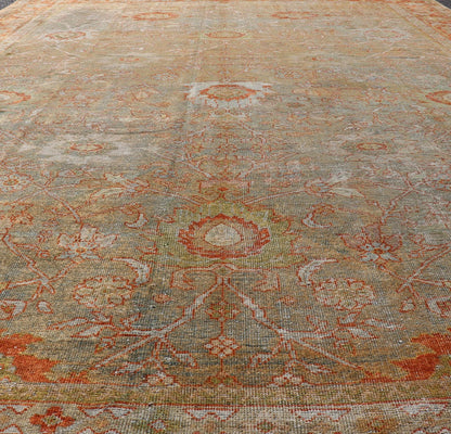 Antique Persian Distressed Sultanabad Rug in Light Green, Lt. Blue, Green, Red. Keivan Woven Arts / rug W22 - 0406 - 15480, country of origin / type: Iran / Sultanabad, circa 1900. Measures: 8'8 x 12'2 This beautiful distressed antique Persian Sult... - Keivan Woven ArtsW22 - 0406 - 15480 - 20115