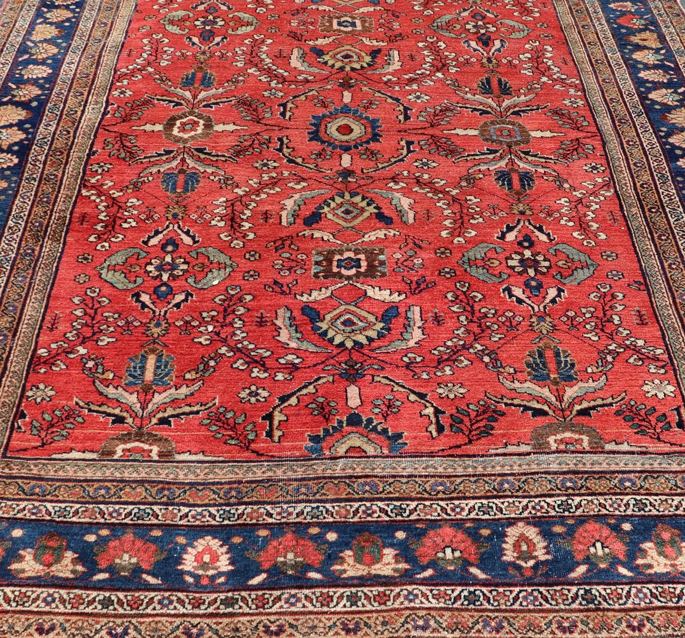 Antique Hand Knotted Persian Mahal Sultanabad rug with All - Over Florals On soft Red Filed and Royal blue border. Antique Hand Knotted Persian Mahal Sultanabad rug. Keivan Woven Arts/ rug/ W22 - 0804, country of origin / type: Iran / Mahal, circa 1... - Keivan Woven ArtsW22 - 0804 - 21559Rug