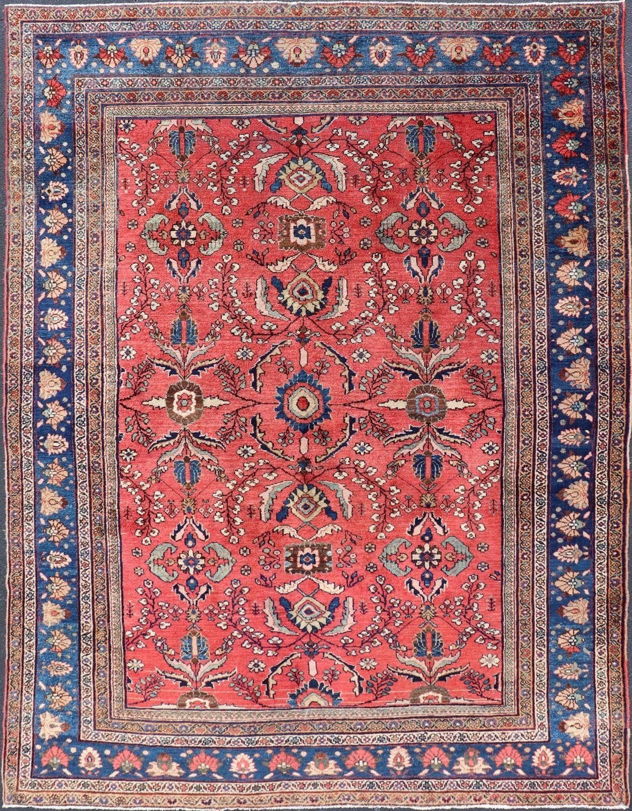 Antique Hand Knotted Persian Mahal Sultanabad rug with All - Over Florals On soft Red Filed and Royal blue border. Antique Hand Knotted Persian Mahal Sultanabad rug. Keivan Woven Arts/ rug/ W22 - 0804, country of origin / type: Iran / Mahal, circa 1... - Keivan Woven ArtsW22 - 0804 - 21559Rug
