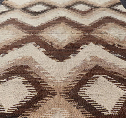 Measures: 3'9 x 5'7 American Navajo Rug with Geometric Diamond All - Over Design in Tan, Brown, Cream. Keivan Woven Arts / rug W22 - 0901, country of origin / type: United States of America / Navajo, circa early - 20th Century. This intriguing vin... - Keivan Woven ArtsW22 - 0901 - 21367Rug