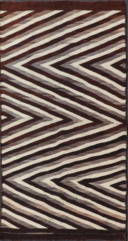Large Early Navajo Tribal Rug with Large Zig - Zag Design in Brown, Ivory Native American Navajo Tribal Rug with Large Zig - Zag Design. Keivan Woven Arts / rug W22 - 0902, country of origin / type: America / Navajo, circa early - 20th Century. ... - Keivan Woven ArtsW22 - 0902 - 21373Rug