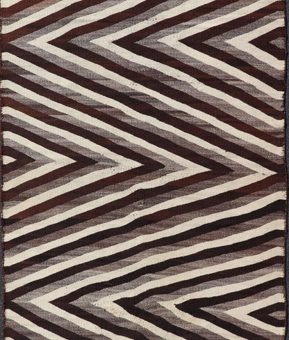 Large Early Navajo Tribal Rug with Large Zig - Zag Design in Brown, Ivory Native American Navajo Tribal Rug with Large Zig - Zag Design. Keivan Woven Arts / rug W22 - 0902, country of origin / type: America / Navajo, circa early - 20th Century. ... - Keivan Woven ArtsW22 - 0902 - 21373