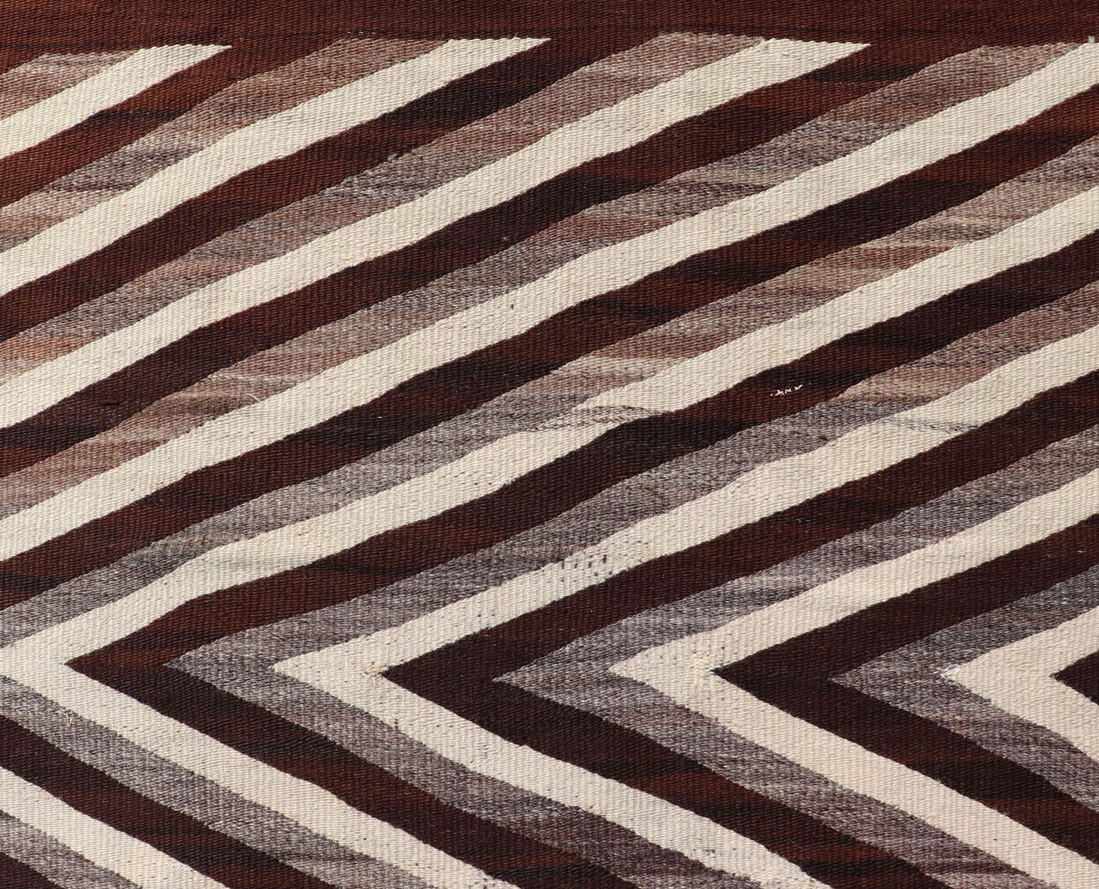 Large Early Navajo Tribal Rug with Large Zig - Zag Design in Brown, Ivory Native American Navajo Tribal Rug with Large Zig - Zag Design. Keivan Woven Arts / rug W22 - 0902, country of origin / type: America / Navajo, circa early - 20th Century. ... - Keivan Woven ArtsW22 - 0902 - 21373