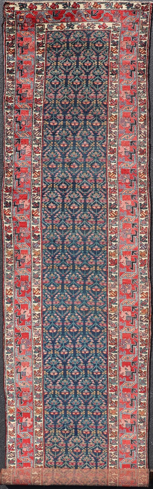 Measures: 3'6 x 17'3 Antique N.W. Persian Runner with Geometric Florals in Dark Blue and Red's. Keivan Woven Arts / rug W22 - 1003, country of origin / type: Iran / N.W. Persian Tribal, circa 1920. This Northwest Persian runner features a deep... - Keivan Woven ArtsW22 - 1003 - 21693Rug