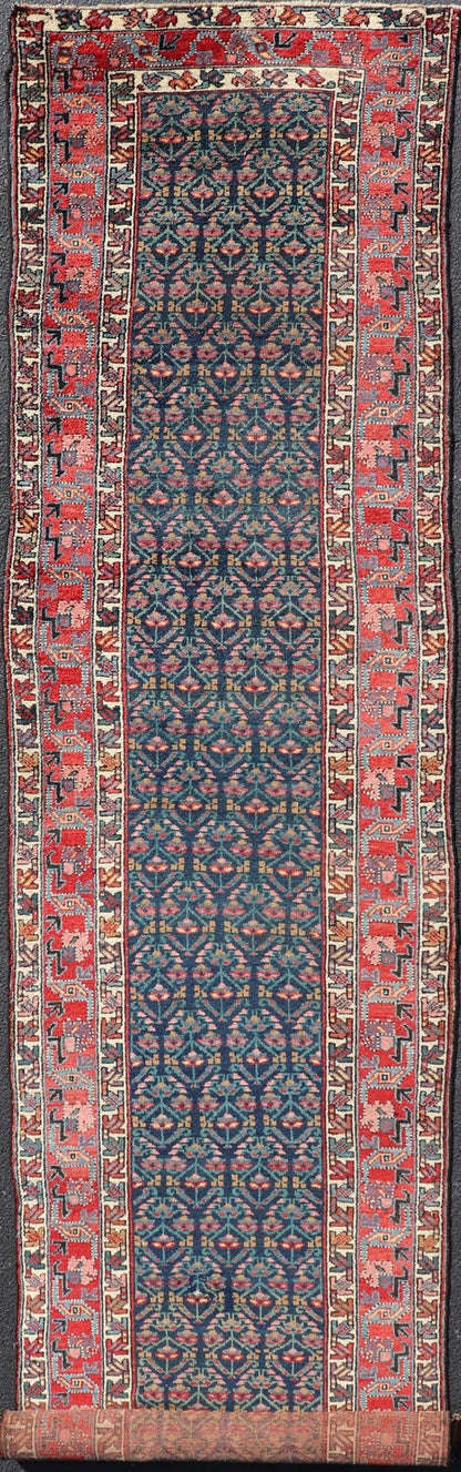 Measures: 3'6 x 17'3 Antique N.W. Persian Runner with Geometric Florals in Dark Blue and Red's. Keivan Woven Arts / rug W22 - 1003, country of origin / type: Iran / N.W. Persian Tribal, circa 1920. This Northwest Persian runner features a deep... - Keivan Woven ArtsW22 - 1003 - 21693Rug