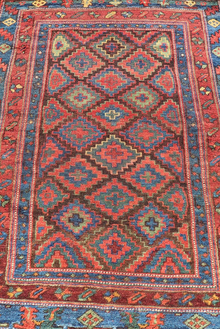 Mid 19th Century Sauj Bulak Kurd Carpet in soft Colors and Diamond Shapes. Antique Tribal Kurdish Rug With All - Over Tribal Motifs in Bright Colors. Keivan Woven Arts / rug/ W22 - 1004 country of origin / type: Persian / Kurdish, circa Mid - 19th Ce... - Keivan Woven ArtsW22 - 1004 - 22584Rug