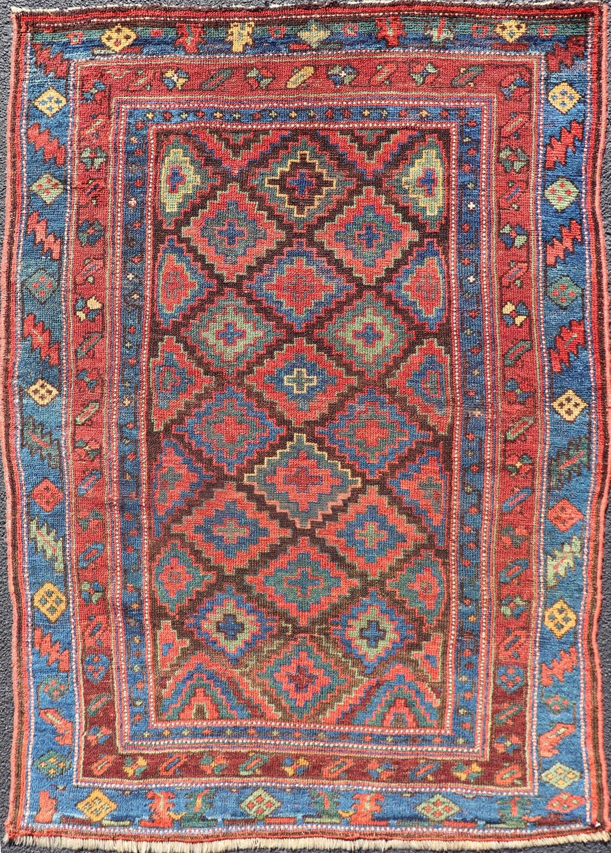 Mid 19th Century Sauj Bulak Kurd Carpet in soft Colors and Diamond Shapes. Antique Tribal Kurdish Rug With All - Over Tribal Motifs in Bright Colors. Keivan Woven Arts / rug/ W22 - 1004 country of origin / type: Persian / Kurdish, circa Mid - 19th Ce... - Keivan Woven ArtsW22 - 1004 - 22584Rug