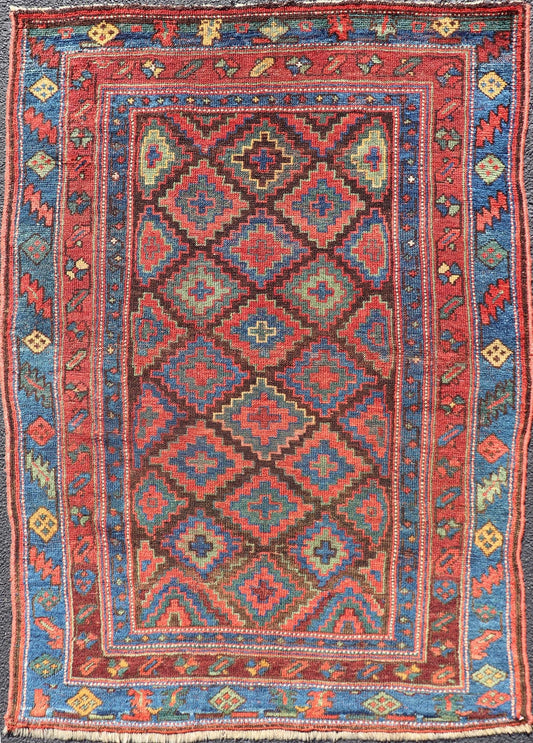 Mid 19th Century Sauj Bulak Kurd Carpet in soft Colors and Diamond Shapes. Antique Tribal Kurdish Rug With All - Over Tribal Motifs in Bright Colors. Keivan Woven Arts / rug/ W22 - 1004 country of origin / type: Persian / Kurdish, circa Mid - 19th Ce... - Keivan Woven ArtsW22 - 1004 - 22584Rug