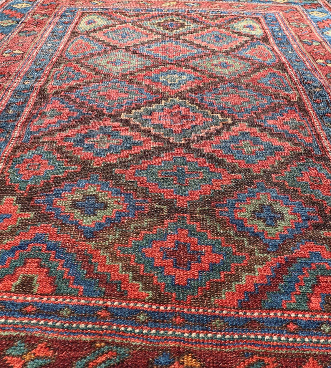 Mid 19th Century Sauj Bulak Kurd Carpet in soft Colors and Diamond Shapes. Antique Tribal Kurdish Rug With All - Over Tribal Motifs in Bright Colors. Keivan Woven Arts / rug/ W22 - 1004 country of origin / type: Persian / Kurdish, circa Mid - 19th Ce... - Keivan Woven ArtsW22 - 1004 - 22584Rug