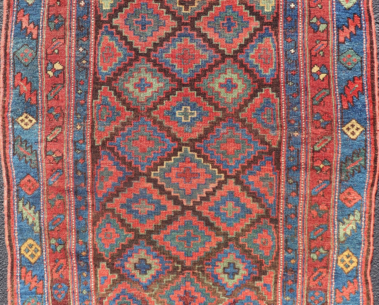 Mid 19th Century Sauj Bulak Kurd Carpet in soft Colors and Diamond Shapes. Antique Tribal Kurdish Rug With All - Over Tribal Motifs in Bright Colors. Keivan Woven Arts / rug/ W22 - 1004 country of origin / type: Persian / Kurdish, circa Mid - 19th Ce... - Keivan Woven ArtsW22 - 1004 - 22584Rug