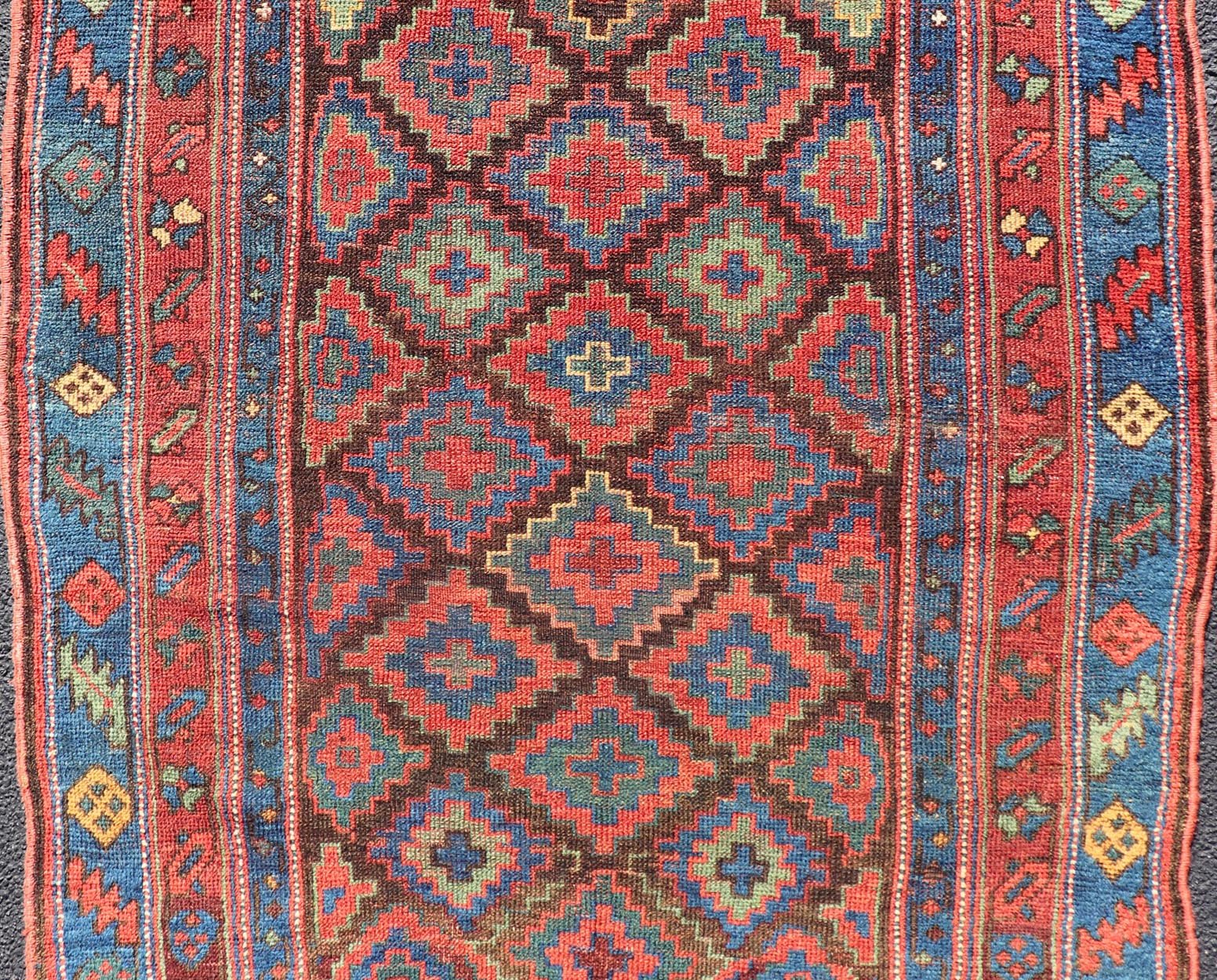 Mid 19th Century Sauj Bulak Kurd Carpet in soft Colors and Diamond Shapes. Antique Tribal Kurdish Rug With All - Over Tribal Motifs in Bright Colors. Keivan Woven Arts / rug/ W22 - 1004 country of origin / type: Persian / Kurdish, circa Mid - 19th Ce... - Keivan Woven ArtsW22 - 1004 - 22584Rug