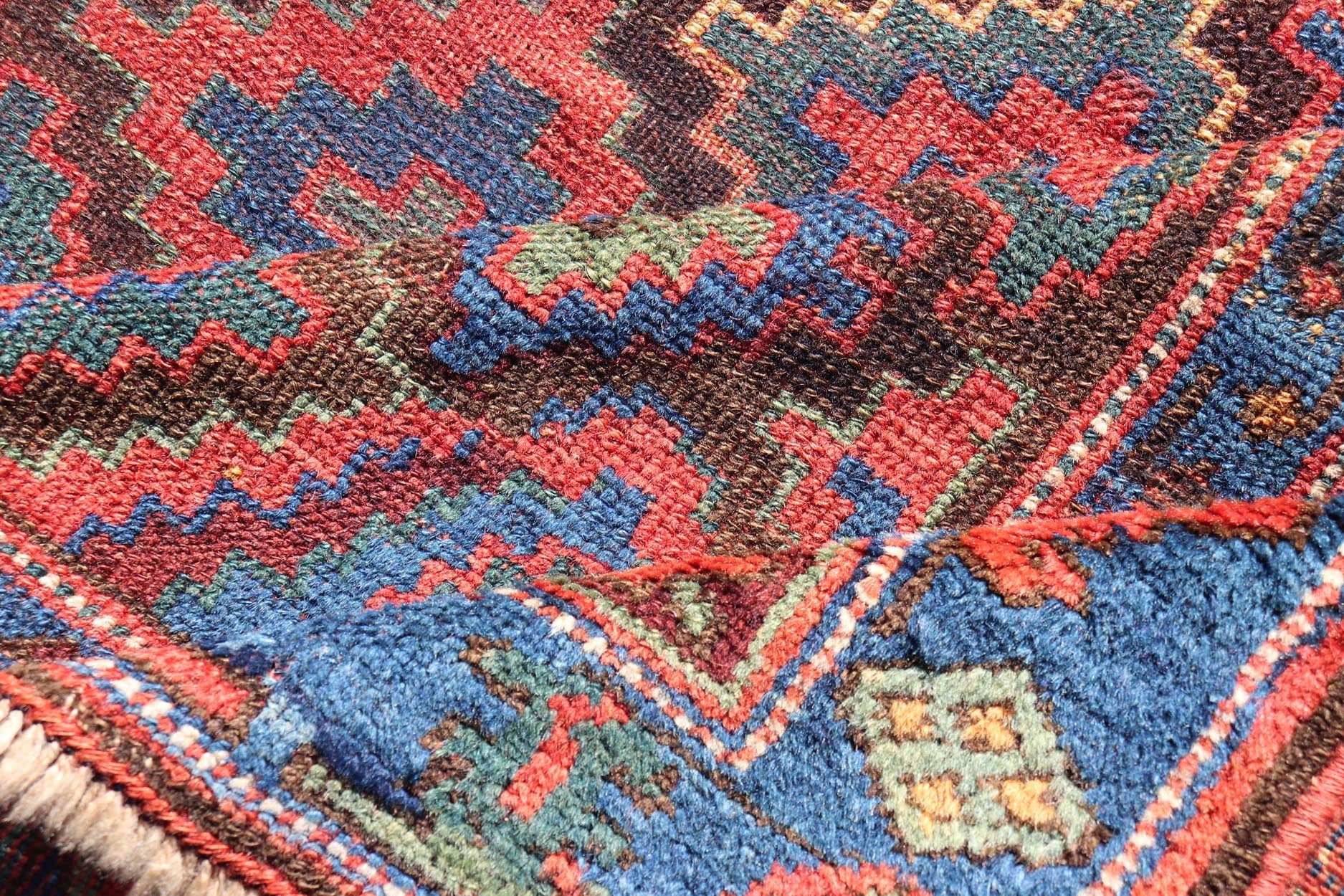 Mid 19th Century Sauj Bulak Kurd Carpet in soft Colors and Diamond Shapes. Antique Tribal Kurdish Rug With All - Over Tribal Motifs in Bright Colors. Keivan Woven Arts / rug/ W22 - 1004 country of origin / type: Persian / Kurdish, circa Mid - 19th Ce... - Keivan Woven ArtsW22 - 1004 - 22584Rug
