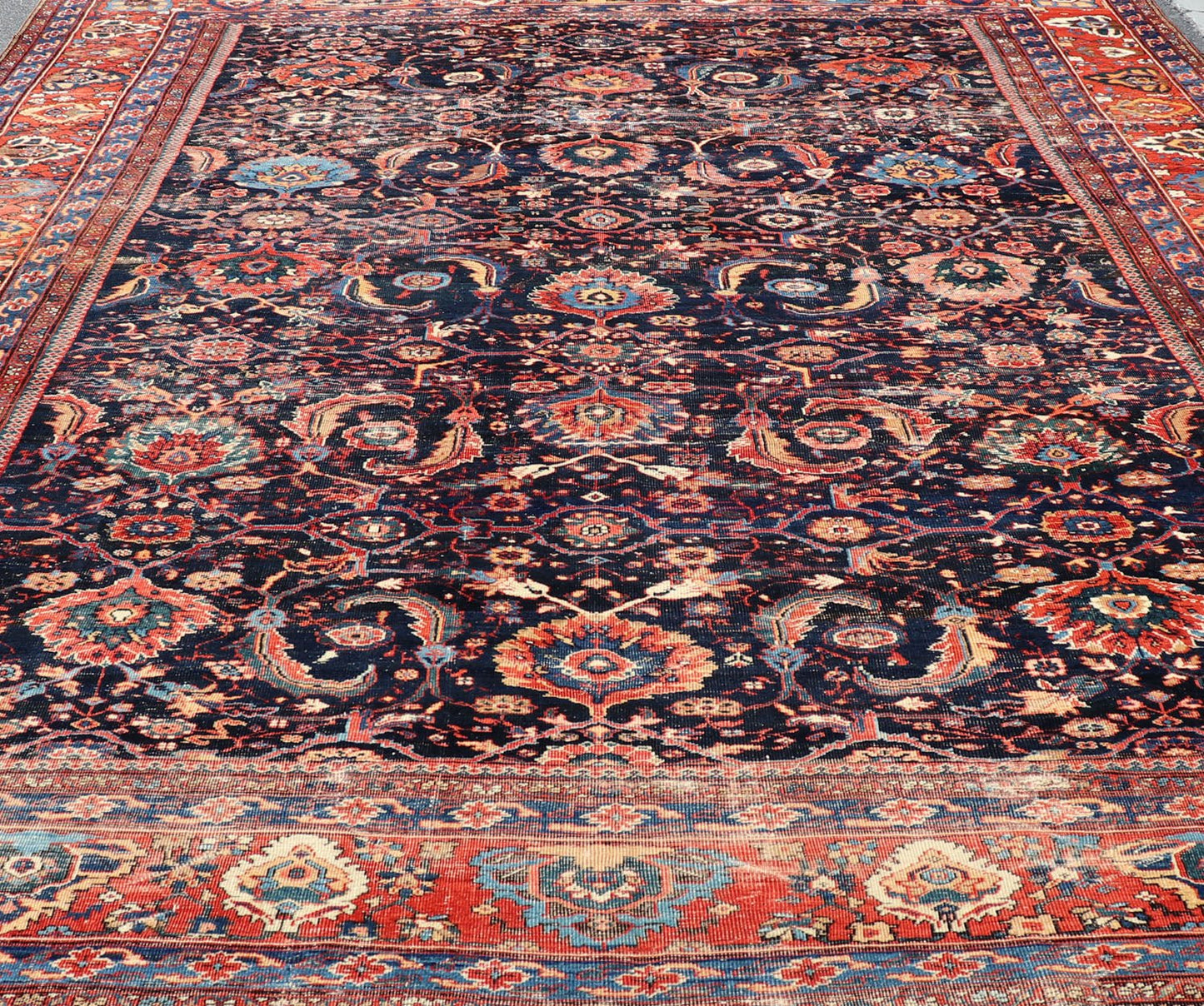 Measures: 13'8 x 18'0 Antique Persian Sultanabad - Mahal Rug with Dark Navy Field and Multi Colors. Keivan Woven Arts / rug W22 - 1103, country of origin / type: Iran / Sultanabad, circa 1880s This antique Persian Sultanabad Mahal rug (circa 1880s) ... - Keivan Woven ArtsW22 - 1103 - 21663Rug