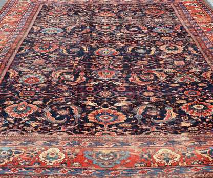 Measures: 13'8 x 18'0 Antique Persian Sultanabad - Mahal Rug with Dark Navy Field and Multi Colors. Keivan Woven Arts / rug W22 - 1103, country of origin / type: Iran / Sultanabad, circa 1880s This antique Persian Sultanabad Mahal rug (circa 1880s) ... - Keivan Woven ArtsW22 - 1103 - 21663Rug