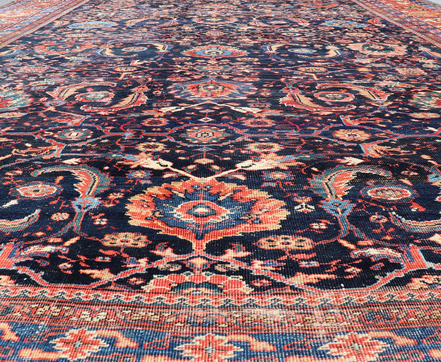 Measures: 13'8 x 18'0 Antique Persian Sultanabad - Mahal Rug with Dark Navy Field and Multi Colors. Keivan Woven Arts / rug W22 - 1103, country of origin / type: Iran / Sultanabad, circa 1880s This antique Persian Sultanabad Mahal rug (circa 1880s) ... - Keivan Woven ArtsW22 - 1103 - 21663Rug