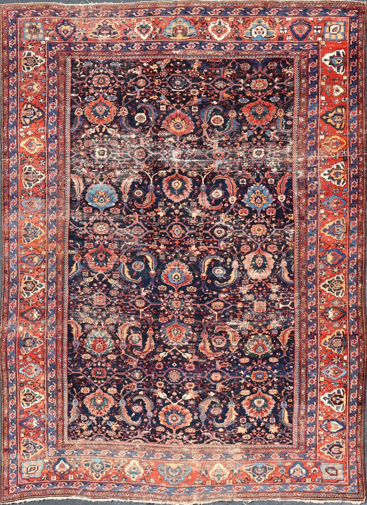 Measures: 13'8 x 18'0 Antique Persian Sultanabad - Mahal Rug with Dark Navy Field and Multi Colors. Keivan Woven Arts / rug W22 - 1103, country of origin / type: Iran / Sultanabad, circa 1880s This antique Persian Sultanabad Mahal rug (circa 1880s) ... - Keivan Woven ArtsW22 - 1103 - 21663Rug