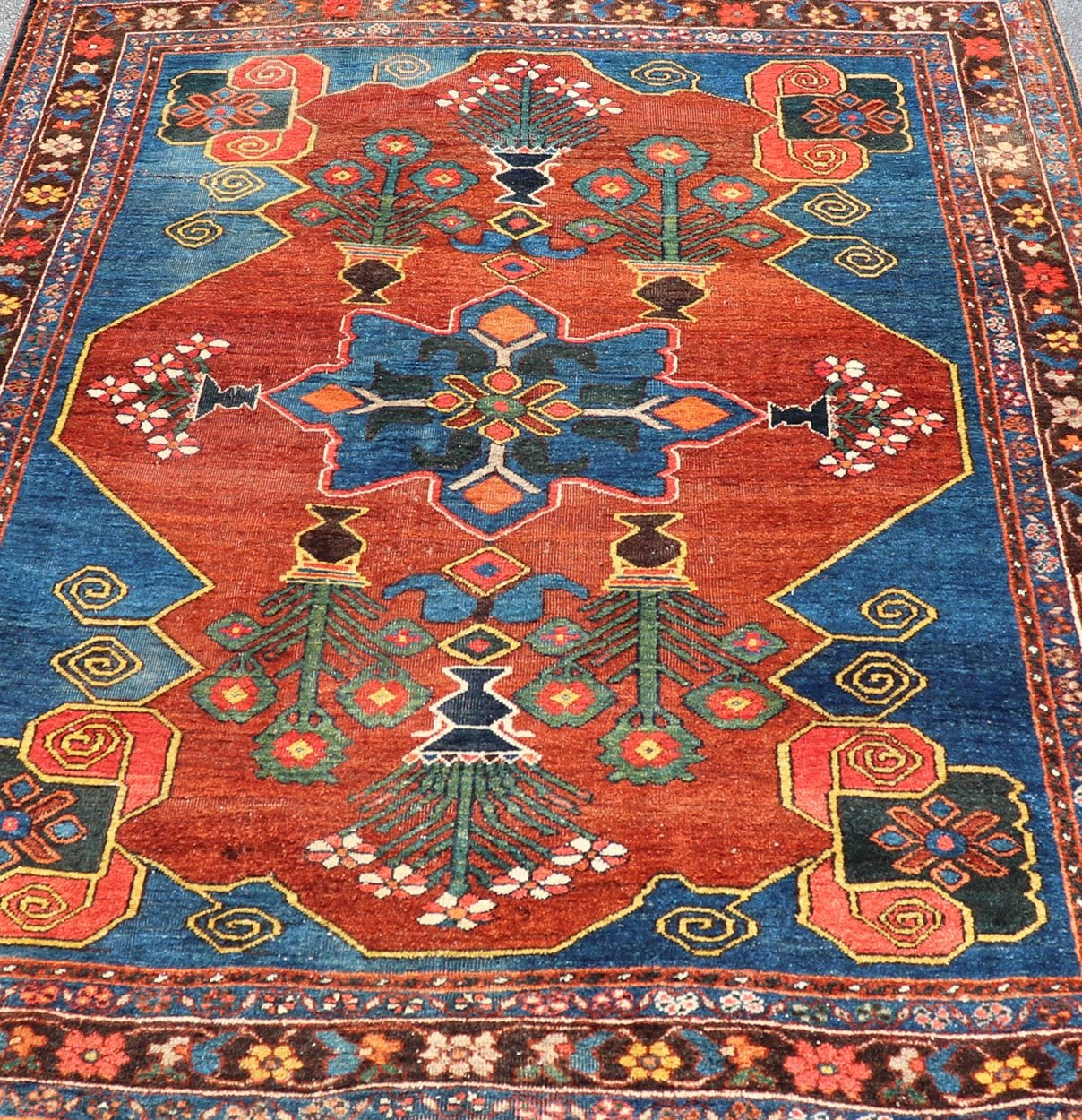 Antique 19th century N.W. Persian Rug with Geometrics in Terracotta Red, Royal Blue, brown & Green. Keivan Woven Arts / W22 - 1201, country of origin / type: Iran / N.W. Persian, circa 1890. Measures: 5'2 x 7'0 This late 19th century antiq... - Keivan Woven ArtsW22 - 1201 - 22644Rug