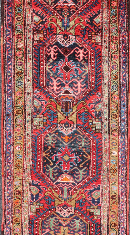 Measures: 2'11 x 10'5 Persian Antique Heriz Runner with All - Over Sub - Geometric Medallion Design. Keivan Woven Arts / rug W22 - 1204, country of origin / type: Persian / Heriz, circa Early - 20th Century. This Antique Persian Heriz runner features a ... - Keivan Woven ArtsW22 - 1204 - 22662