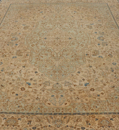 This very finely woven transitional rug, made in Turkey, is inspired by Haj Jalili Tabriz of 19th century. The light colors include cream color field and light blue highlights. Circa 1980's 9'5 x 13'5 - Keivan Woven ArtsWL - 214815 - 1193Rug