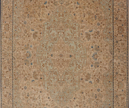 This very finely woven transitional rug, made in Turkey, is inspired by Haj Jalili Tabriz of 19th century. The light colors include cream color field and light blue highlights. Circa 1980's 9'5 x 13'5 - Keivan Woven ArtsWL - 214815 - 1193Rug