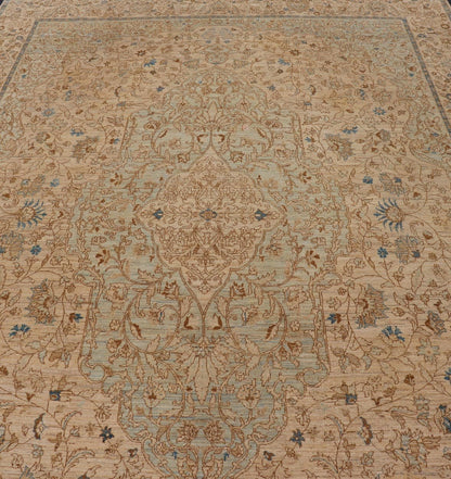 This very finely woven transitional rug, made in Turkey, is inspired by Haj Jalili Tabriz of 19th century. The light colors include cream color field and light blue highlights. Circa 1980's 9'5 x 13'5 - Keivan Woven ArtsWL - 214815 - 1193Rug