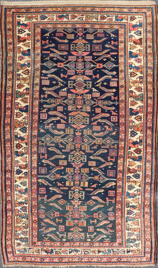 Antique Kurdish Rug With All - Over Geometric Design on a Blue Background. Country of Origin: Iran; Type: Kurdish; Design: Tribal, Floral, Tribal Motif; Keivan Woven Arts: Rug X23 - 0103. Measures: 4'6 x 8'0 This antique rug from Persia features ge... - Keivan Woven ArtsX23 - 0103 - 24211