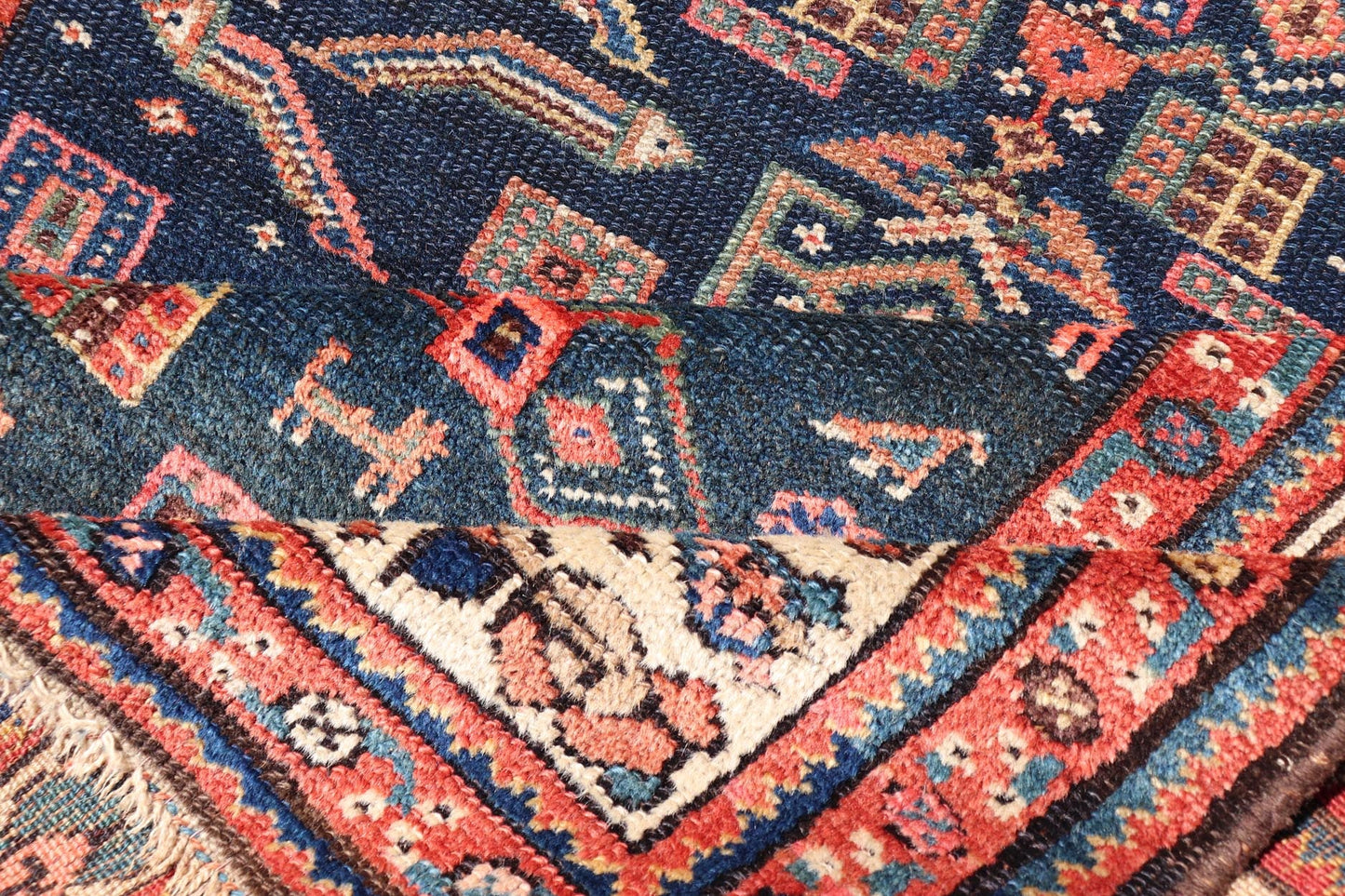 Antique Kurdish Rug With All - Over Geometric Design on a Blue Background. Country of Origin: Iran; Type: Kurdish; Design: Tribal, Floral, Tribal Motif; Keivan Woven Arts: Rug X23 - 0103. Measures: 4'6 x 8'0 This antique rug from Persia features ge... - Keivan Woven ArtsX23 - 0103 - 24211