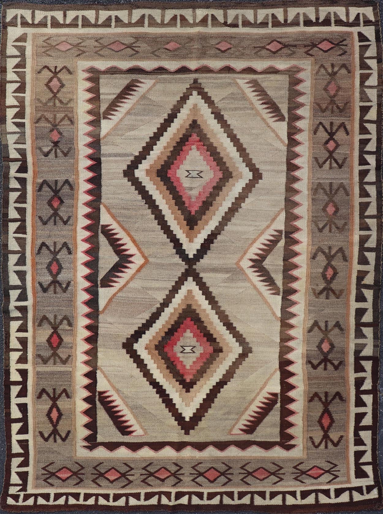 Vintage Large hand Woven Navajo Rug in Gray, Ivory, Black, Brown's, and Red. Keivan Woven Arts rug X23 - 0107, country of origin / type: America / Navajo, circa 1930 Measures: 4'4 x 6'3 This intriguing vintage Navajo rug was woven in the Navajo ar... - Keivan Woven ArtsX23 - 0107 - 23524Rug