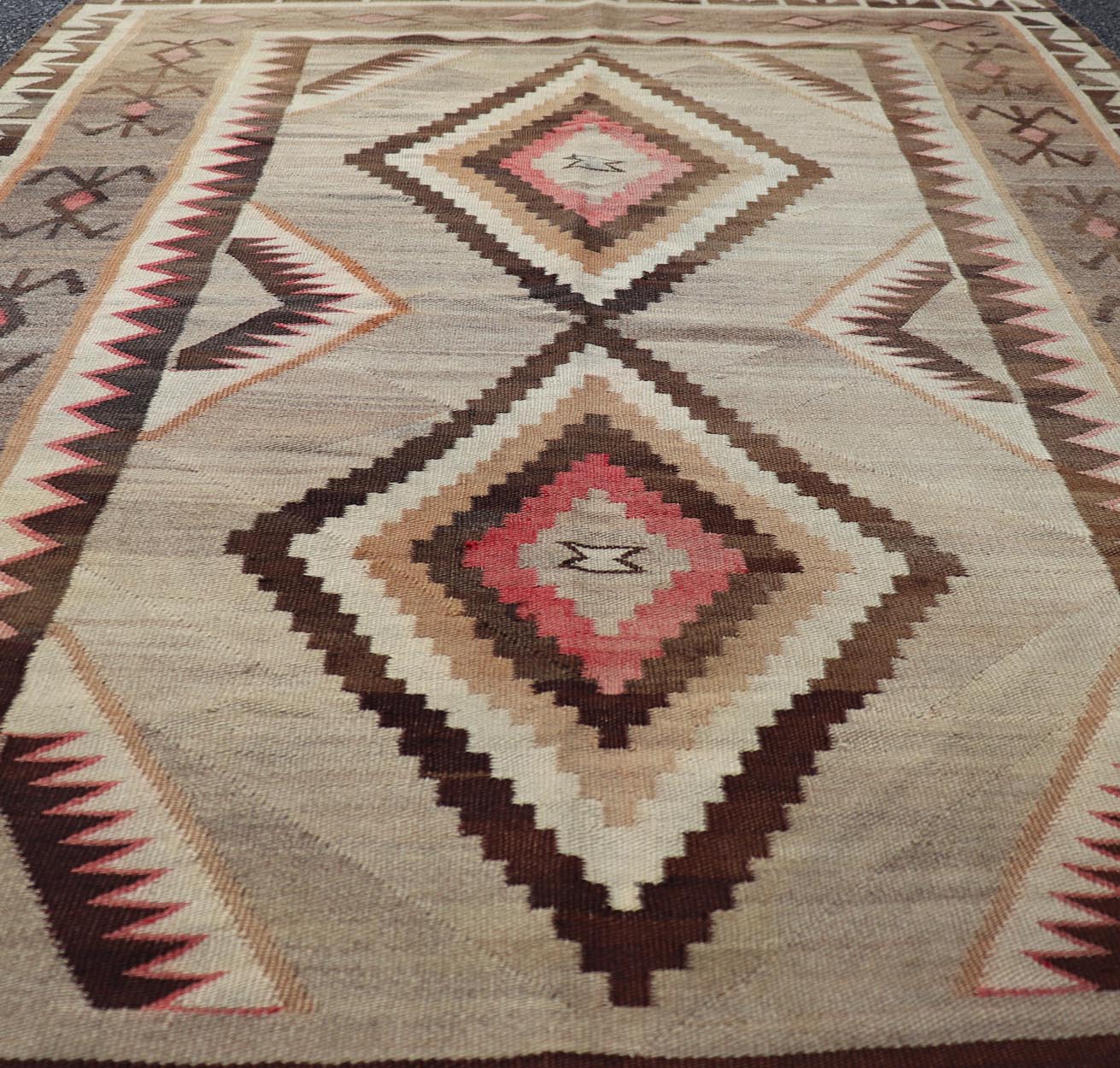 Vintage Large hand Woven Navajo Rug in Gray, Ivory, Black, Brown's, and Red. Keivan Woven Arts rug X23 - 0107, country of origin / type: America / Navajo, circa 1930 Measures: 4'4 x 6'3 This intriguing vintage Navajo rug was woven in the Navajo ar... - Keivan Woven ArtsX23 - 0107 - 23524Rug