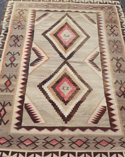 Vintage Large hand Woven Navajo Rug in Gray, Ivory, Black, Brown's, and Red. Keivan Woven Arts rug X23 - 0107, country of origin / type: America / Navajo, circa 1930 Measures: 4'4 x 6'3 This intriguing vintage Navajo rug was woven in the Navajo ar... - Keivan Woven ArtsX23 - 0107 - 23524Rug