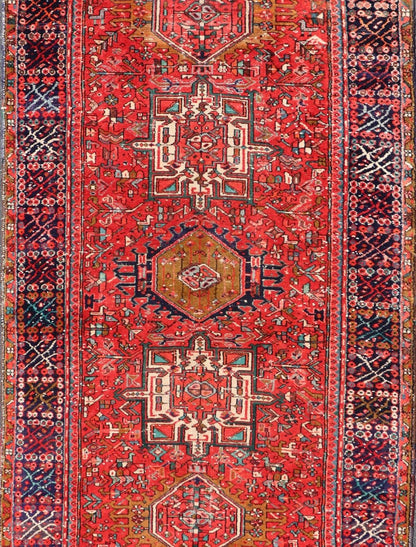 Vintage Persian Karajeh - Heriz Gallery with Geometric Medallions On A Red Ground. Keivan Woven Arts , rug X23 - 0109, country of origin / type: Persian / Heriz - Karajeh, circa mid - 20th century. Measures: 5'0 x 12'4 This gallery rug incorporates a di... - Keivan Woven ArtsX23 - 0109 - 24354Rug