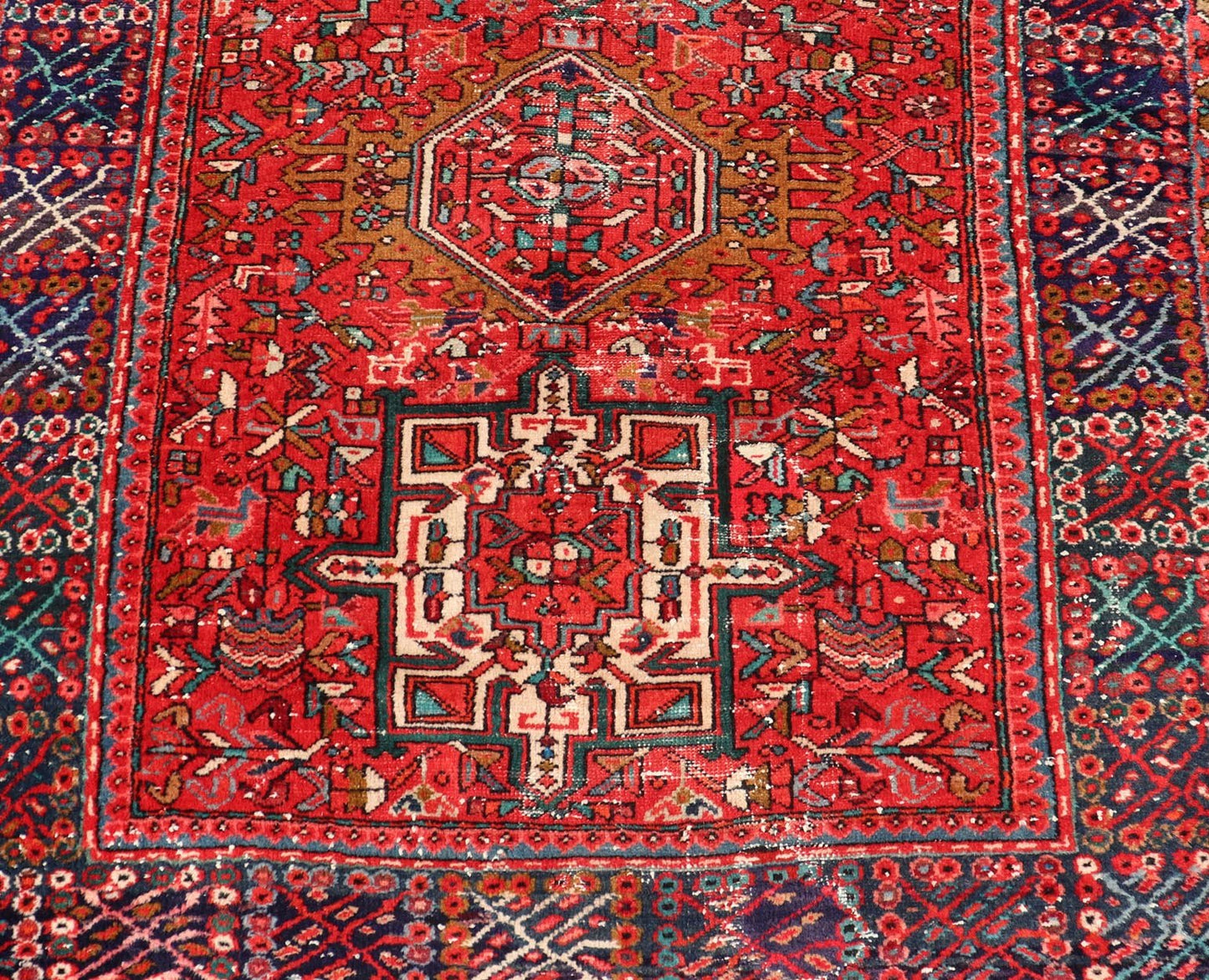 Vintage Persian Karajeh - Heriz Gallery with Geometric Medallions On A Red Ground. Keivan Woven Arts , rug X23 - 0109, country of origin / type: Persian / Heriz - Karajeh, circa mid - 20th century. Measures: 5'0 x 12'4 This gallery rug incorporates a di... - Keivan Woven ArtsX23 - 0109 - 24354Rug