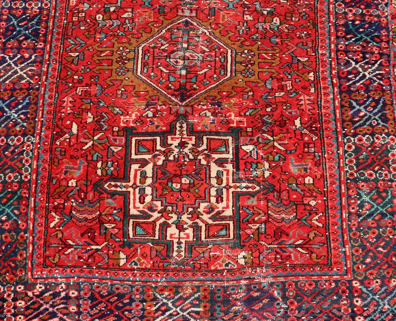 Vintage Persian Karajeh - Heriz Gallery with Geometric Medallions On A Red Ground. Keivan Woven Arts , rug X23 - 0109, country of origin / type: Persian / Heriz - Karajeh, circa mid - 20th century. Measures: 5'0 x 12'4 This gallery rug incorporates a di... - Keivan Woven ArtsX23 - 0109 - 24354Rug