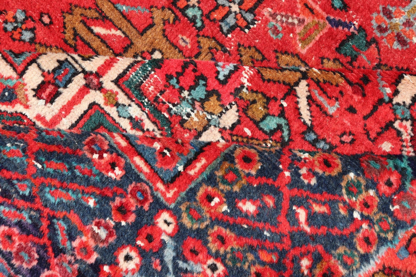 Vintage Persian Karajeh - Heriz Gallery with Geometric Medallions On A Red Ground. Keivan Woven Arts , rug X23 - 0109, country of origin / type: Persian / Heriz - Karajeh, circa mid - 20th century. Measures: 5'0 x 12'4 This gallery rug incorporates a di... - Keivan Woven ArtsX23 - 0109 - 24354Rug