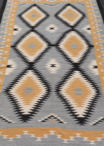 Unusually oversized vintage Navajo commissioned piece and made by Rena Whitewater, 20th century. set on gray background, this beautiful large Navajo displays two parallel rows of three diamonds in yellow, white, stacked diamonds from priv... - Keivan Woven ArtsX23 - 0301 - 23516Rug