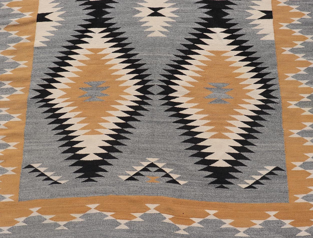 Unusually oversized vintage Navajo commissioned piece and made by Rena Whitewater, 20th century. set on gray background, this beautiful large Navajo displays two parallel rows of three diamonds in yellow, white, stacked diamonds from priv... - Keivan Woven ArtsX23 - 0301 - 23516Rug