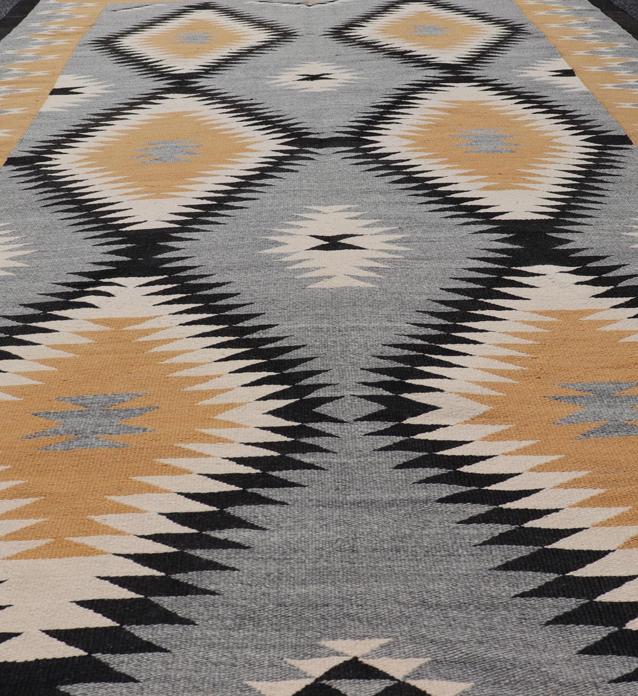 Unusually oversized vintage Navajo commissioned piece and made by Rena Whitewater, 20th century. set on gray background, this beautiful large Navajo displays two parallel rows of three diamonds in yellow, white, stacked diamonds from priv... - Keivan Woven ArtsX23 - 0301 - 23516Rug