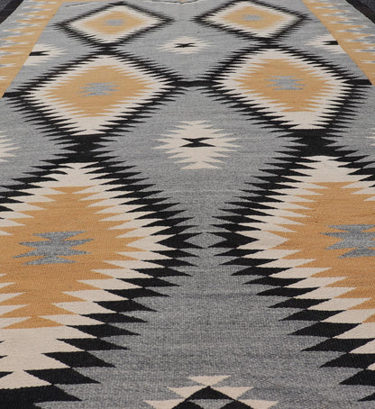 Unusually oversized vintage Navajo commissioned piece and made by Rena Whitewater, 20th century. set on gray background, this beautiful large Navajo displays two parallel rows of three diamonds in yellow, white, stacked diamonds from priv... - Keivan Woven ArtsX23 - 0301 - 23516Rug