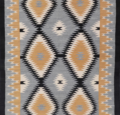 Unusually oversized vintage Navajo commissioned piece and made by Rena Whitewater, 20th century. set on gray background, this beautiful large Navajo displays two parallel rows of three diamonds in yellow, white, stacked diamonds from priv... - Keivan Woven ArtsX23 - 0301 - 23516Rug
