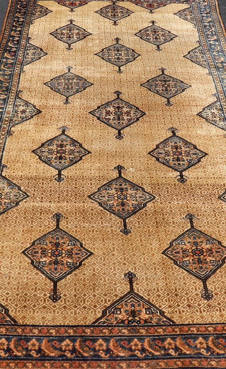 Antique Persian Serab Gallery with Tribal Geometric Design in Camel, Green, Blue. rug X23 - 0302 - 371; Keivan Woven Arts, country of origin / type: Persian / Sarab, circa 1900. Measures: 5'6 x 11'10 This beautiful antique Persian Serab runner rests... - Keivan Woven ArtsX23 - 0302 - 371 - 24217