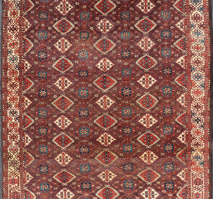 Early 19th century Chodor main carpet from Turkmenistan Antique Turkomen Rug in Wool with Repeating Gul Design in Brown, Blue, and Red. Keivan Woven Arts; rug X23 - 0306 - 201, country of origin / type: Turkestan / Turkomen circa 1820s. Measure... - Keivan Woven ArtsX23 - 0306 - 201 - 23547Rug