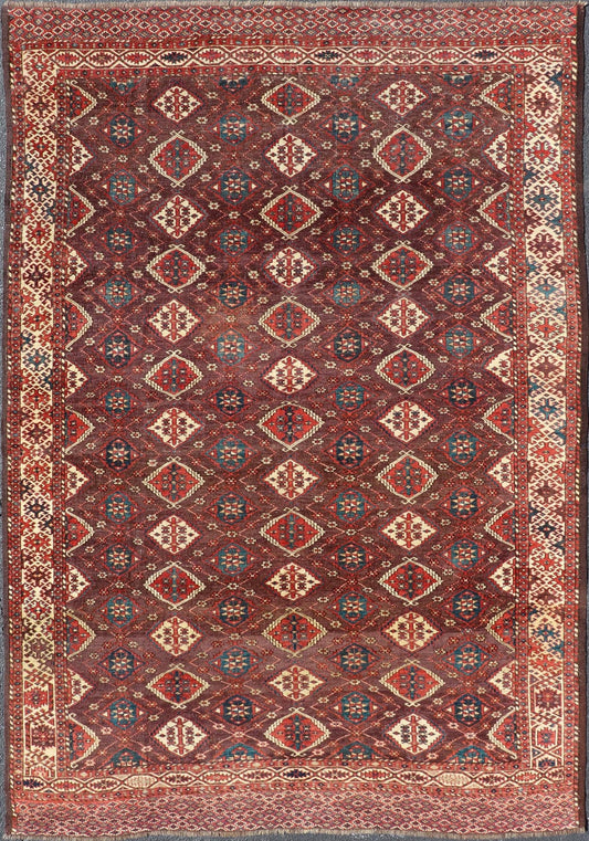 Early 19th century Chodor main carpet from Turkmenistan Antique Turkomen Rug in Wool with Repeating Gul Design in Brown, Blue, and Red. Keivan Woven Arts; rug X23 - 0306 - 201, country of origin / type: Turkestan / Turkomen circa 1820s. Measure... - Keivan Woven ArtsX23 - 0306 - 201 - 23547Rug